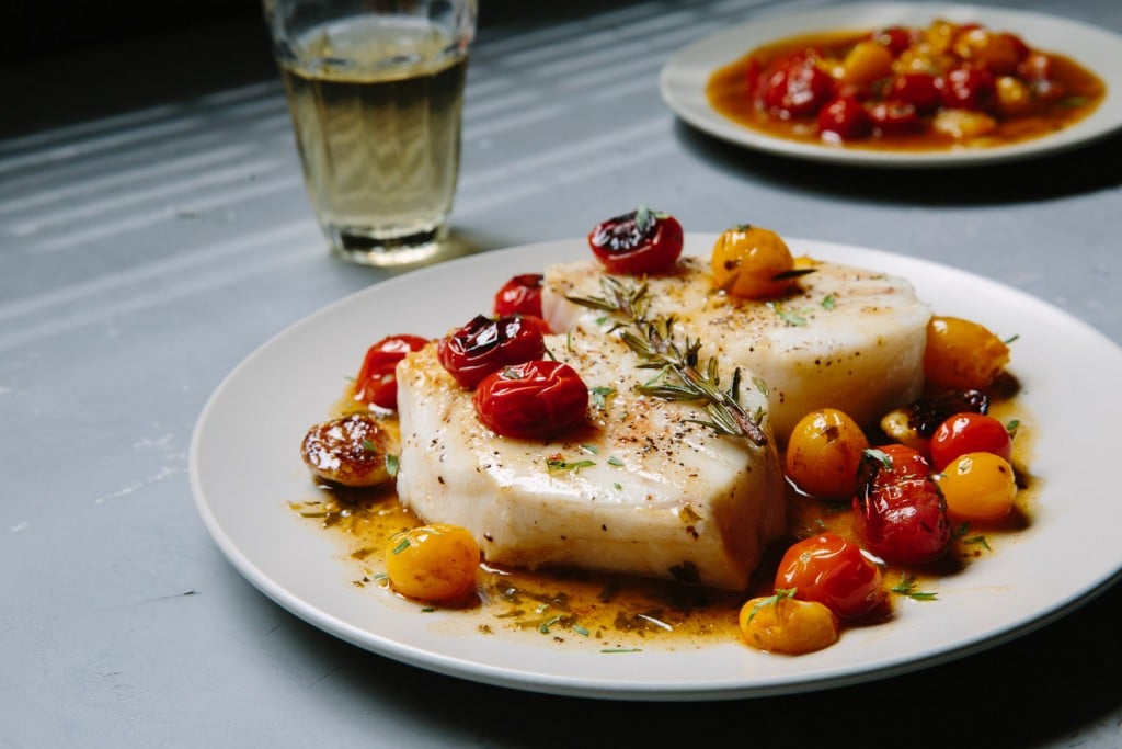 Fresh springtime Sea Bass recipe from Premier Meat Company. Cherry Tomato sauce and light lemon on fillet.